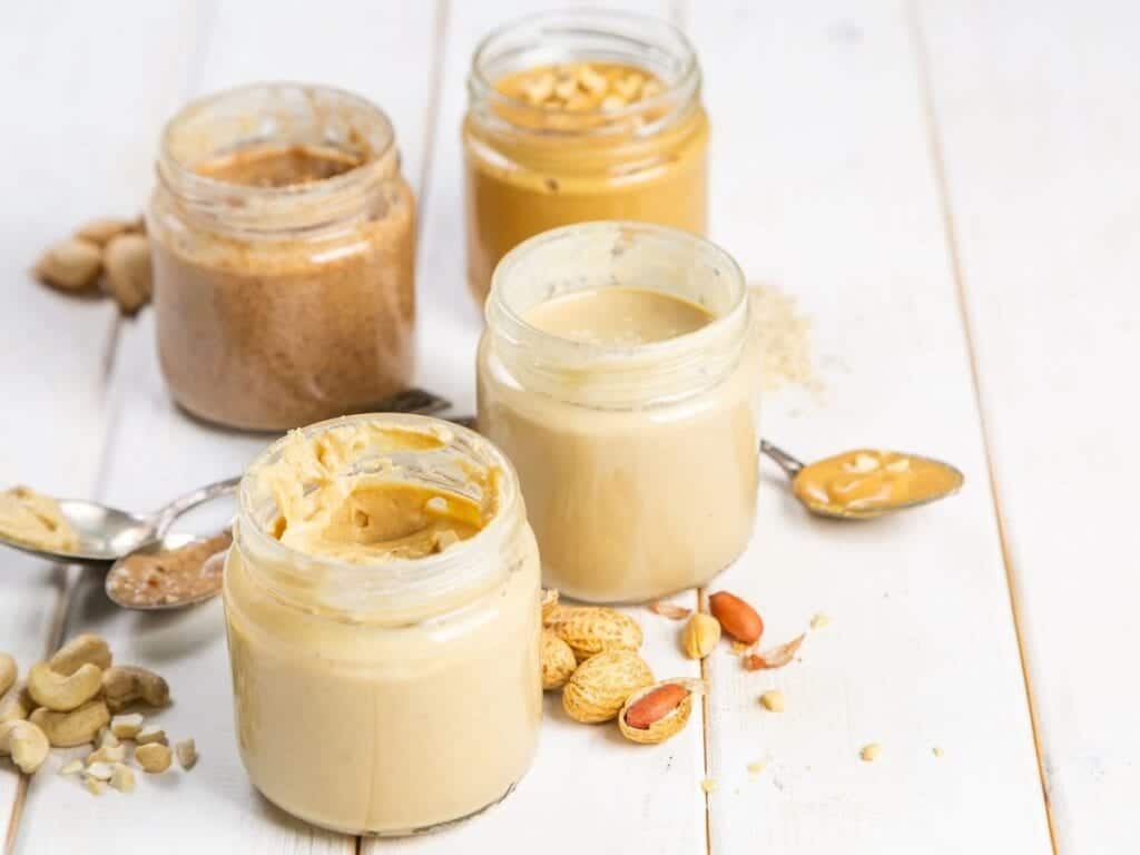 It's almost impossible to eat homemade nut butter outside your home without putting it in an inconvenient plastic container or a small glass container and carrying a spoon.