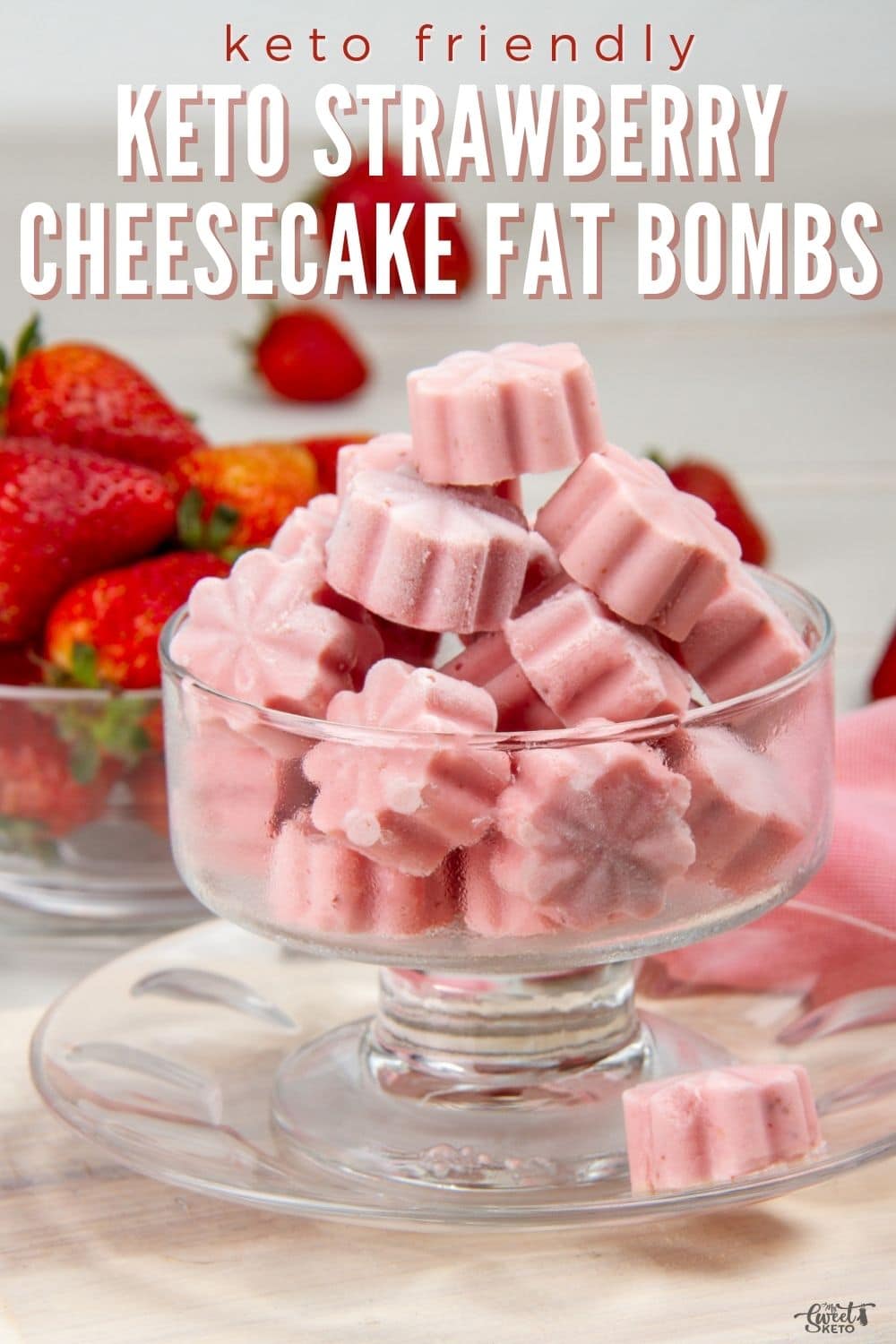 Five ingredients that, when combined, become the perfect keto strawberry cheesecake fat bombs — cold and delicate one-biters you won’t want to share. #keto #fatbombs